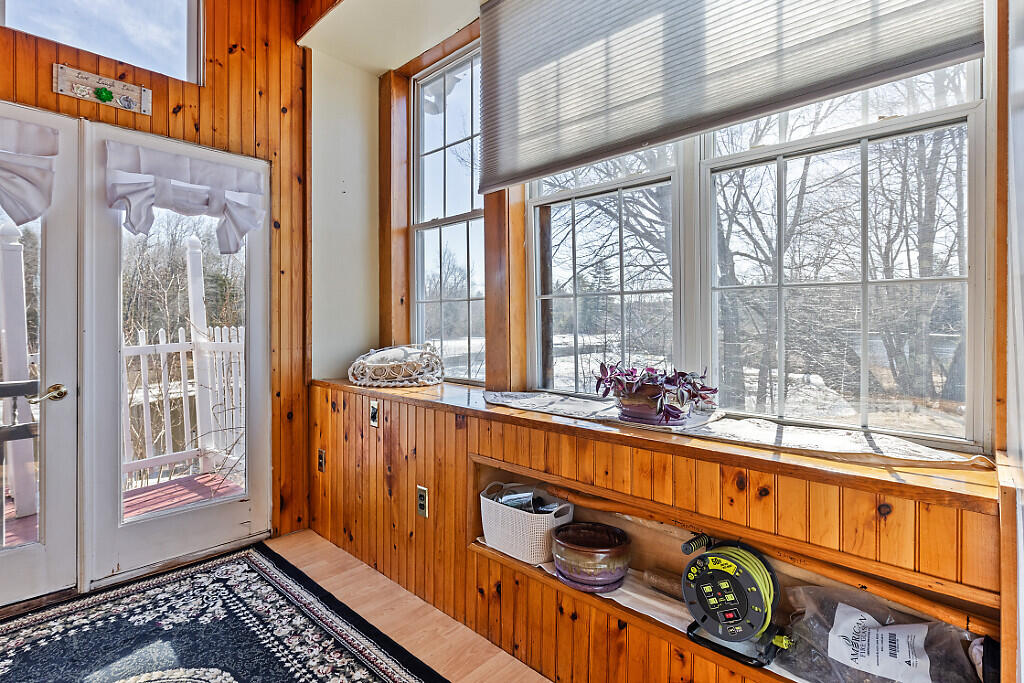 12 Town Line Road Belgrade, ME 04917 - Photo 32 of 77 SUNPORCH ENTRY