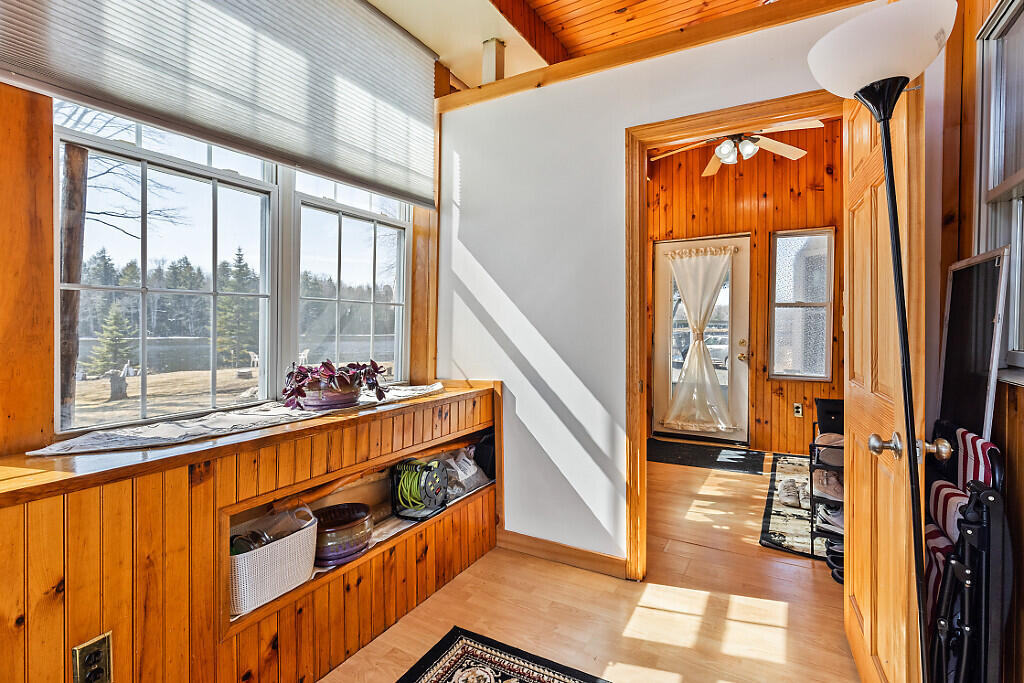 12 Town Line Road Belgrade, ME 04917 - Photo 33 of 77 SUNPORCH ENTRY