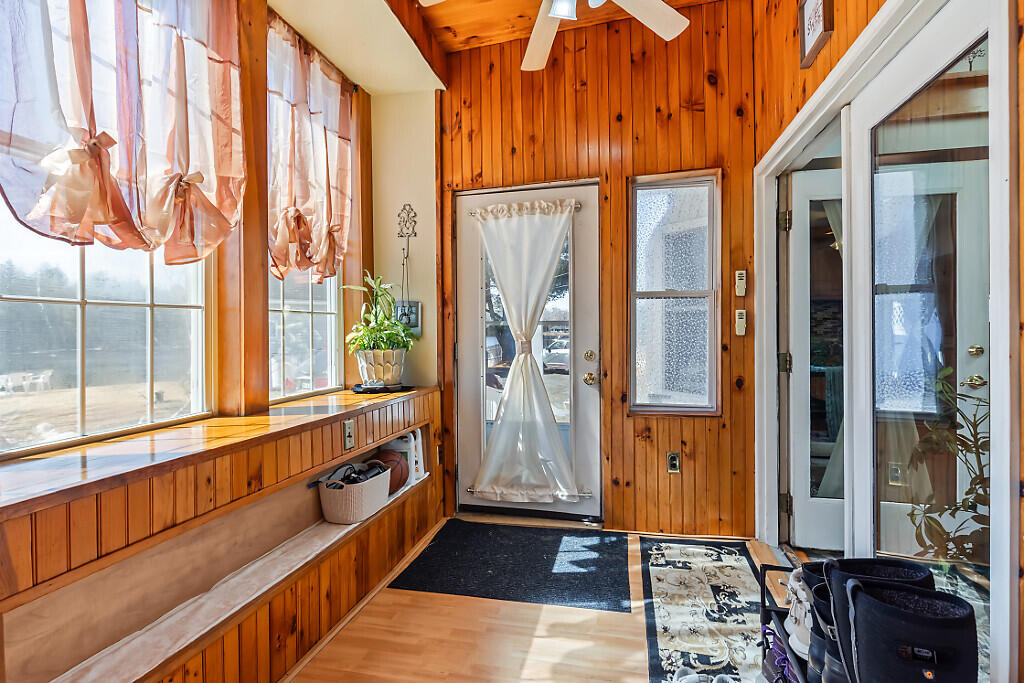 12 Town Line Road Belgrade, ME 04917 - Photo 34 of 77 SUNPORCH ENTRY