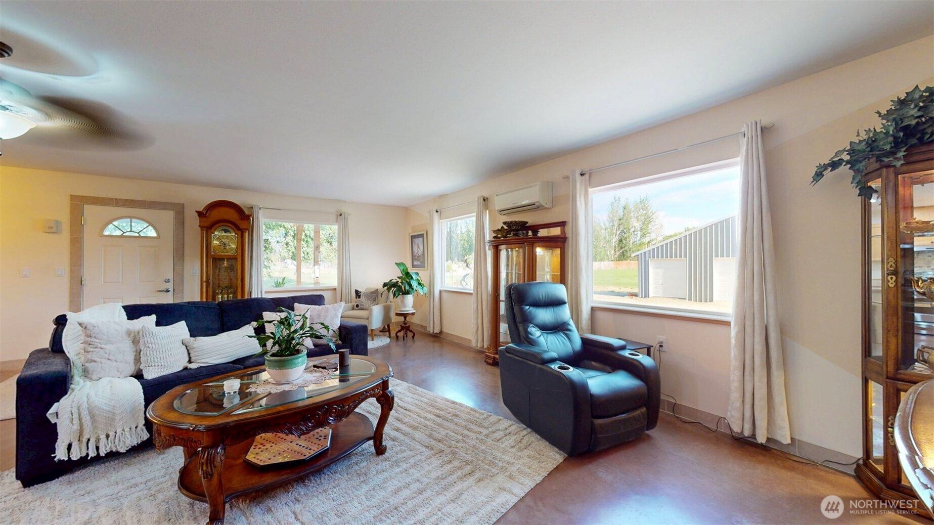46 Shumway Road Omak, WA 98841 - Photo 6 of 40 a living room with furniture and a window