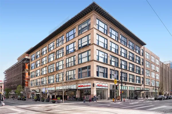 a view of a building on the street