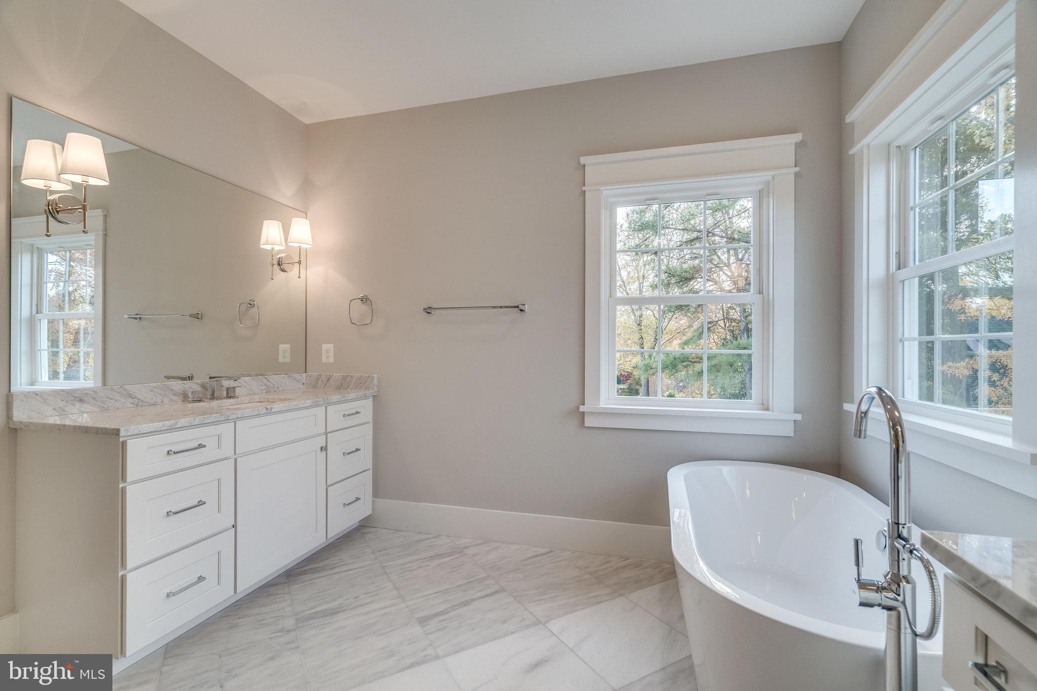 8016 Wellington Road Alexandria, VA 22308 - Photo 24 of 43 Dual vanities and free-standing soaking tub