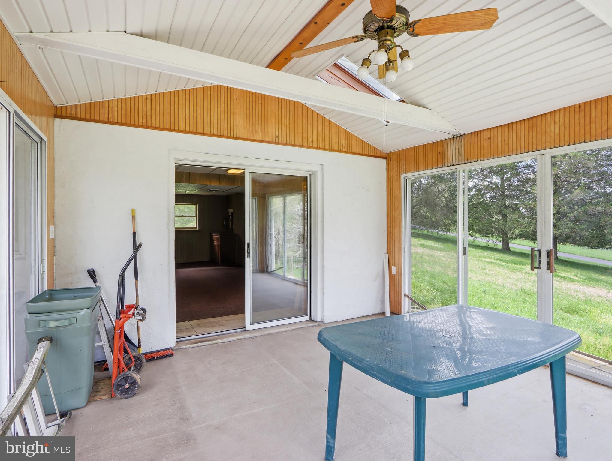 1926 Stringtown Road Sparks Glencoe, MD 21152 - Photo 29 of 46 Sun Room exit from 3 sides out to yard & patio