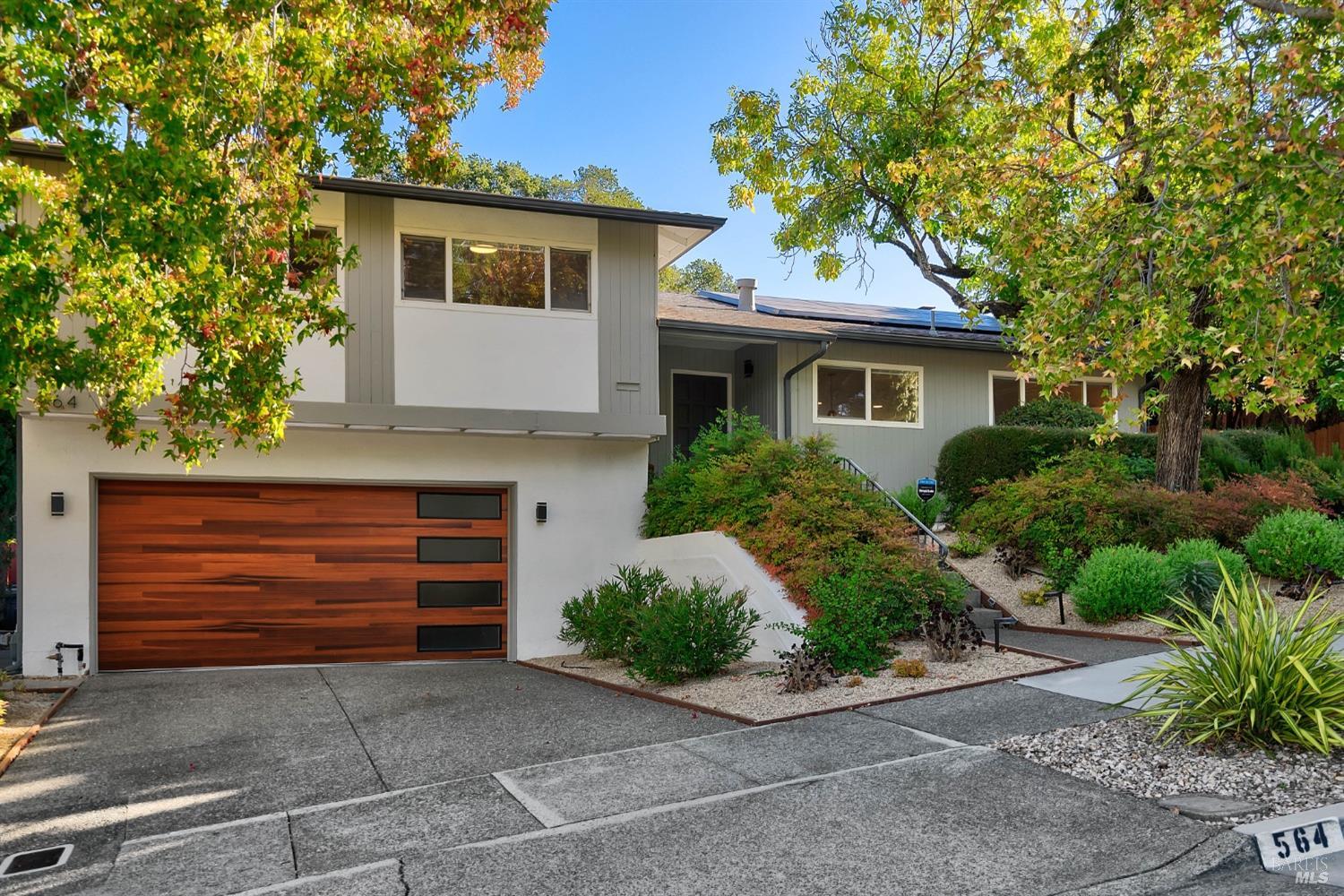 564 Montecillo Road San Rafael, CA 94903 - Photo 1 of 1 a front view of a house with a yard