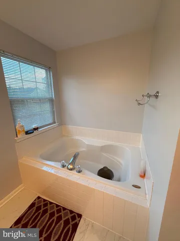 a bathroom with a bathtub