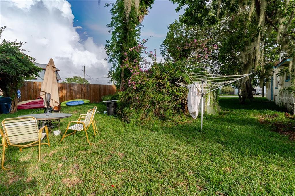 5323 Circle Drive Weeki Wachee, FL 34607 - Photo 62 of 77 a view of a chair and table in the garden