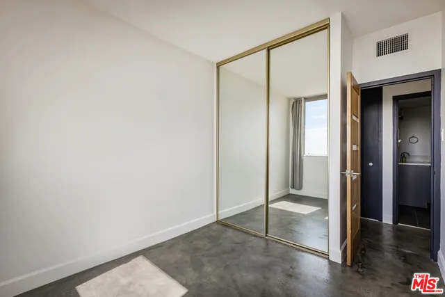 a view of a room with a window