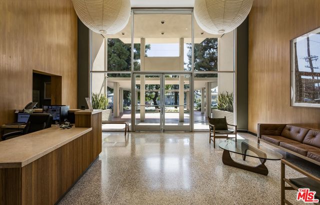a view of a living room and dining room