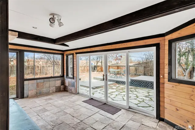 a view of an empty room and window