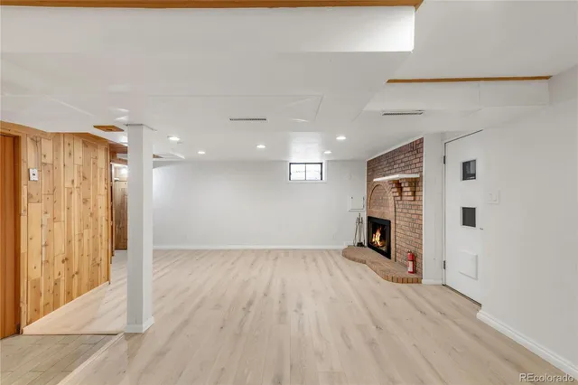 a bathroom with a sink toilet and mirror