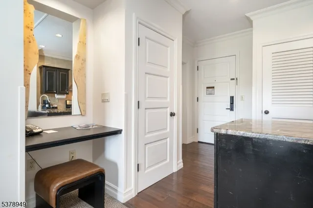 a dining room with table and chairs