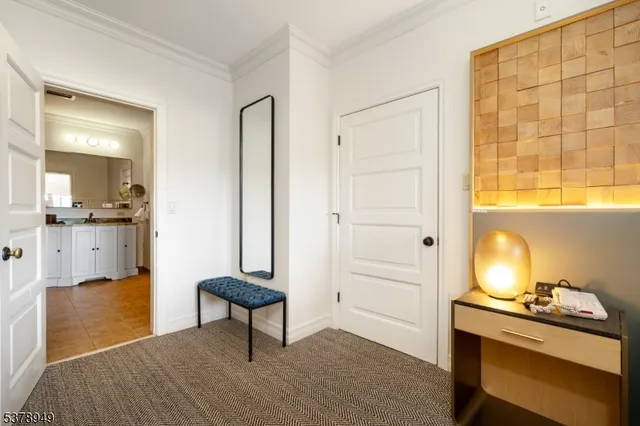 a view of a livingroom with furniture and a window
