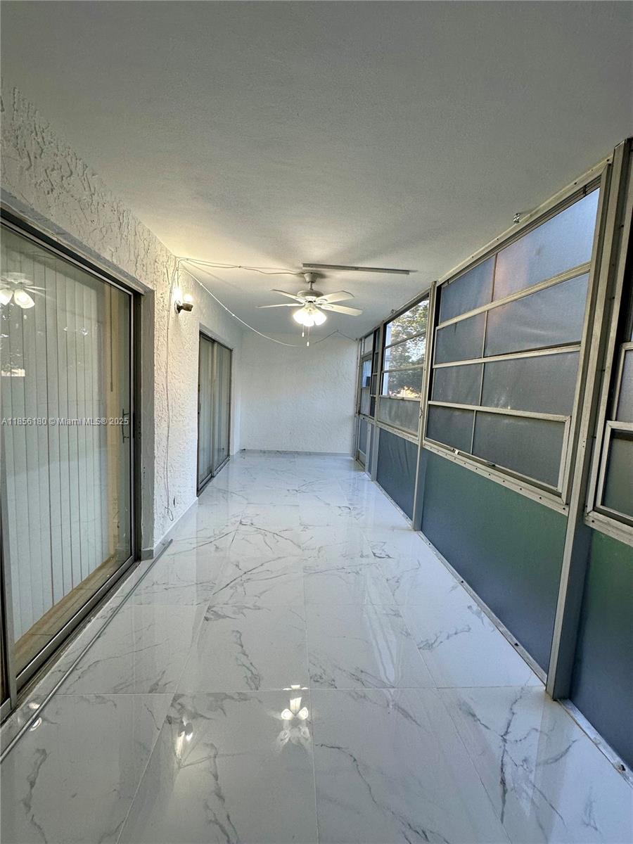 603 South State Road 7, Unit 1E Margate, FL 33068 - Photo 7 of 8 a view of empty room