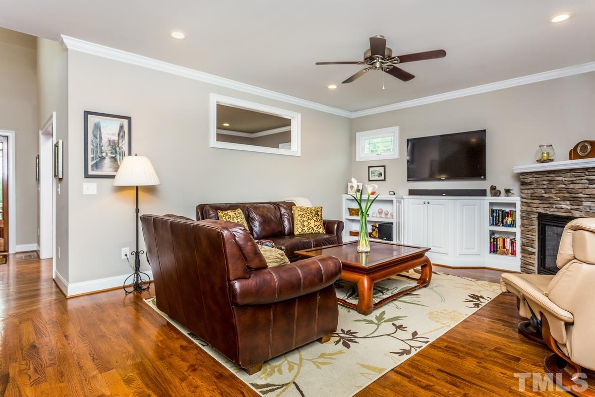 1429 Nottingham Road Raleigh, NC 27607 - Photo 3 of 25 a living room with furniture and a flat screen tv