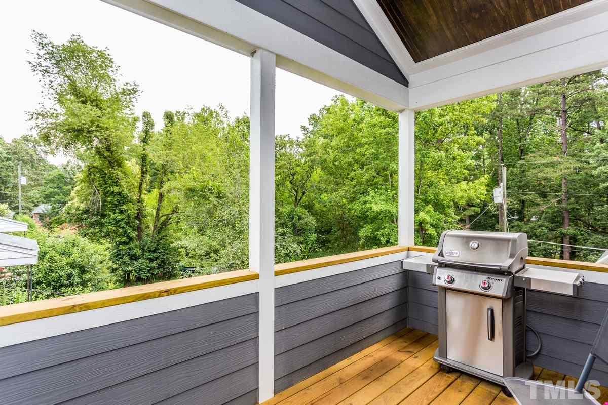 1429 Nottingham Road Raleigh, NC 27607 - Photo 21 of 25 a view of a balcony with chairs