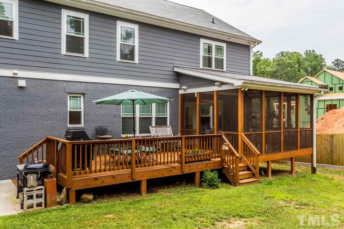 1429 Nottingham Road Raleigh, NC 27607 - Photo 25 of 25 a view of a house with a backyard and porch