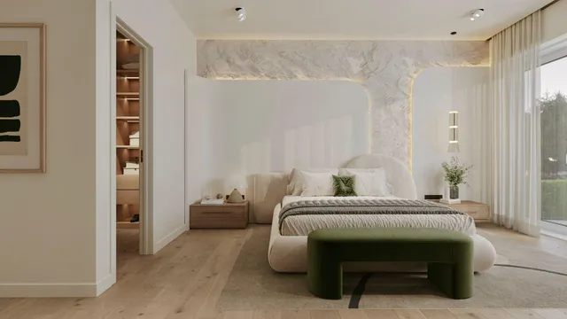 a bedroom with a bed and a table