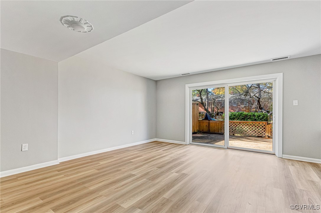 9101 Derbyshire Road, Unit E Henrico, VA 23229 - Photo 6 of 37 Spare room featuring light hardwood / wood-style f