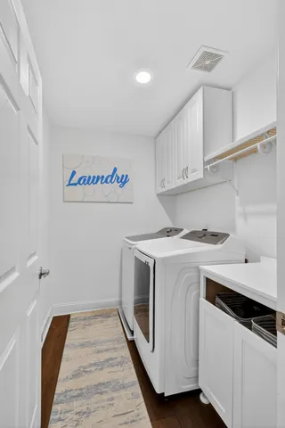 a utility room with washer and dryer