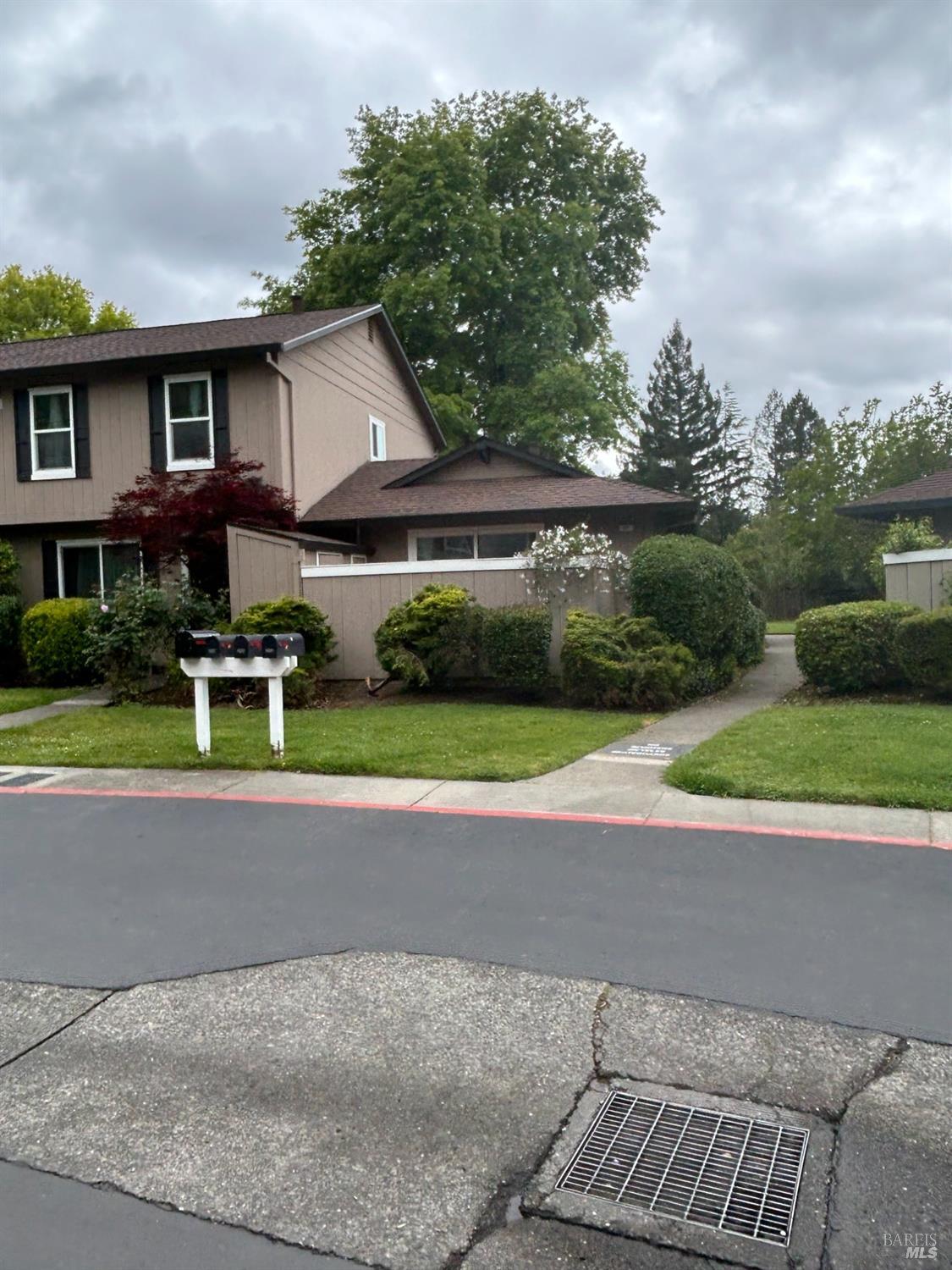 a house with a yard and a garden