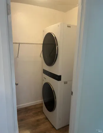 a close view of a utility room with dryer and washer
