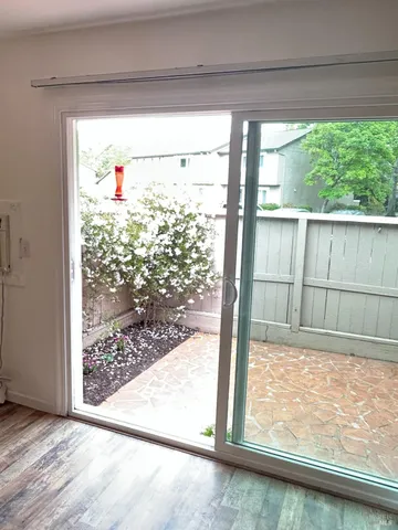 a view of a living room and a window