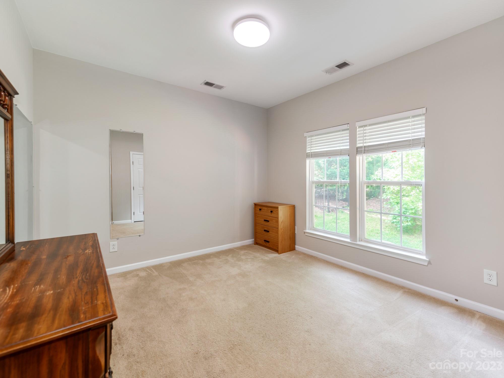 7219 Meyer Road Fort Mill, SC 29715 - Photo 16 of 41 a view of an empty room with a window