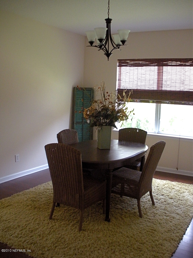55 Amherst Place Ponte Vedra, FL 32081 - Photo 4 of 17 a view of a dining room with furniture