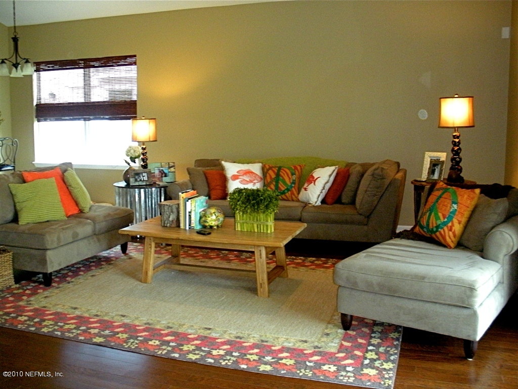 55 Amherst Place Ponte Vedra, FL 32081 - Photo 6 of 17 a living room with furniture and a rug