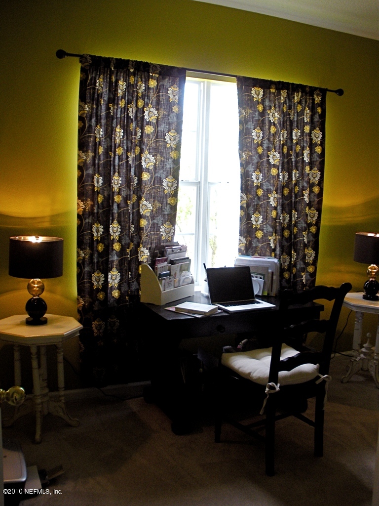 55 Amherst Place Ponte Vedra, FL 32081 - Photo 7 of 17 a view of a workspace with furniture and a window