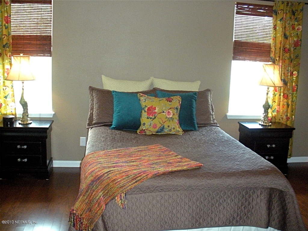 55 Amherst Place Ponte Vedra, FL 32081 - Photo 8 of 17 a bedroom with a bed and window