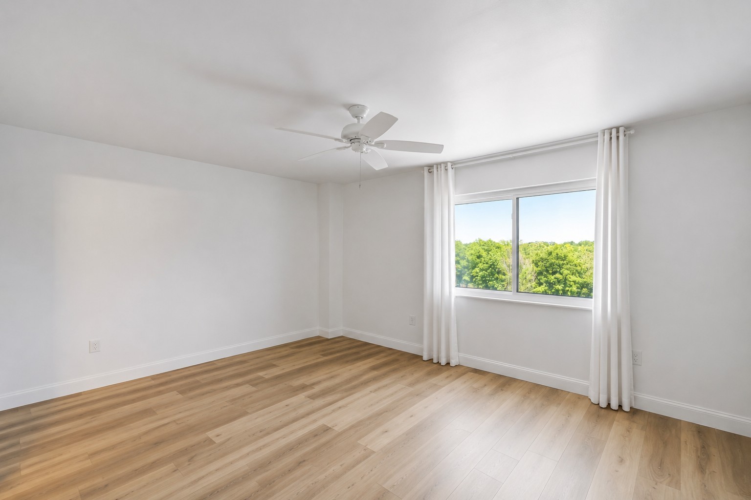 200 Sanders Ferry Road, Unit 2406 Hendersonville, TN 37075 - Photo 12 of 34 an empty room with wooden floor and windows