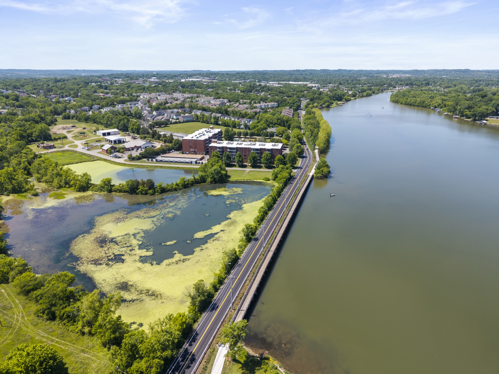 200 Sanders Ferry Road, Unit 2406 Hendersonville, TN 37075 - Photo 29 of 34 an aerial view of lake and residential houses with outdoor space
