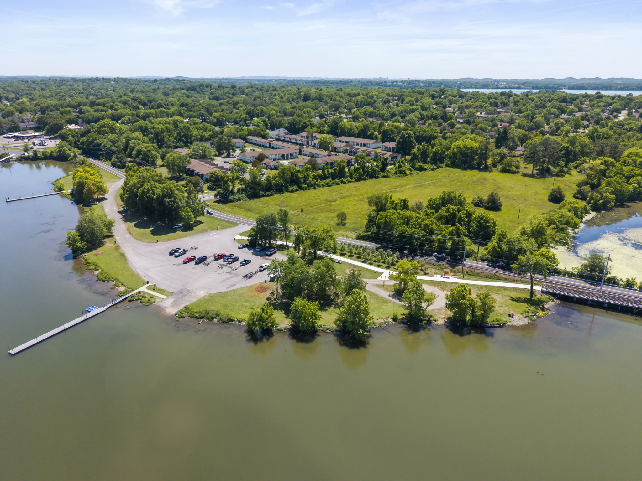 200 Sanders Ferry Road, Unit 2406 Hendersonville, TN 37075 - Photo 30 of 34 an aerial view of lake and residential houses with outdoor space