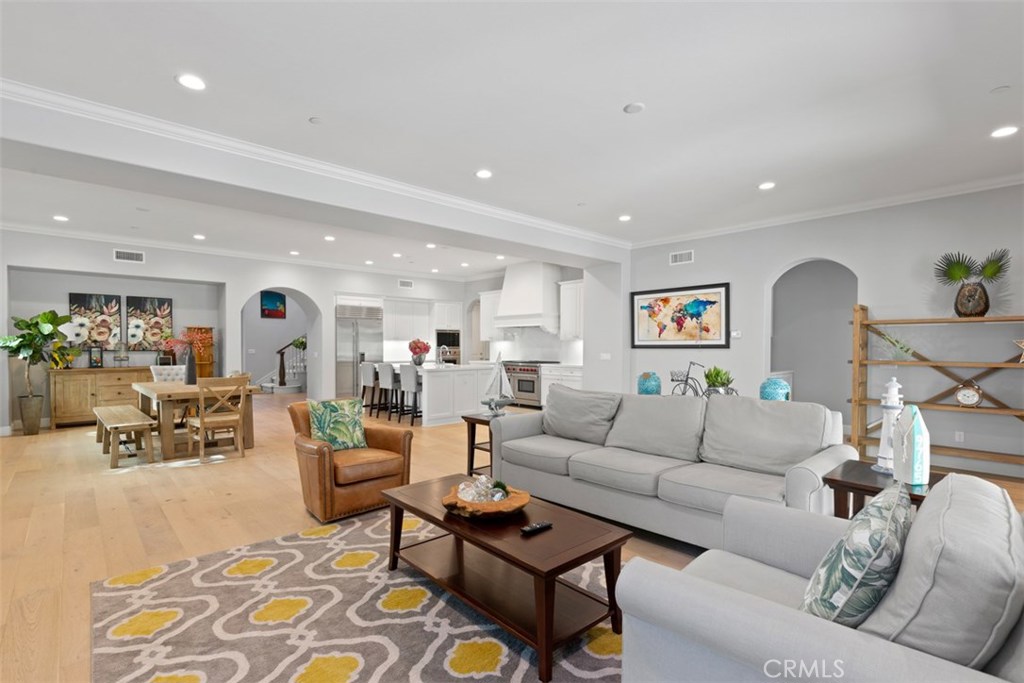 26 Lowland Irvine, CA 92602 - Photo 11 of 44 a living room with furniture and wooden floor