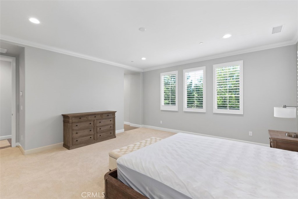 26 Lowland Irvine, CA 92602 - Photo 22 of 44 a bedroom with a bed and a window