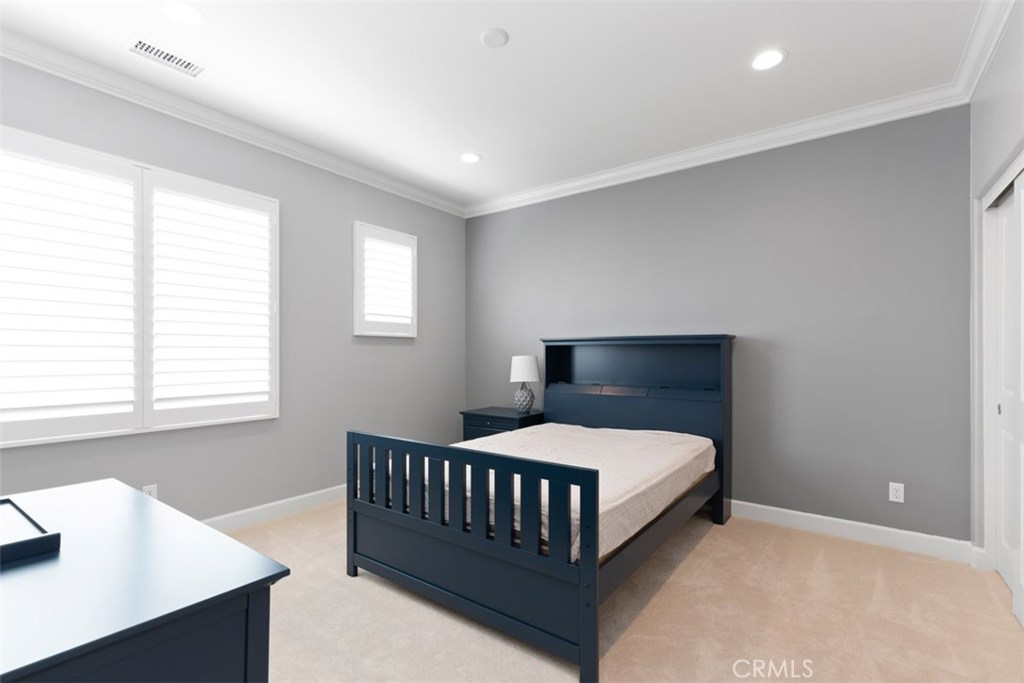 26 Lowland Irvine, CA 92602 - Photo 27 of 44 a bedroom with a bed and a window