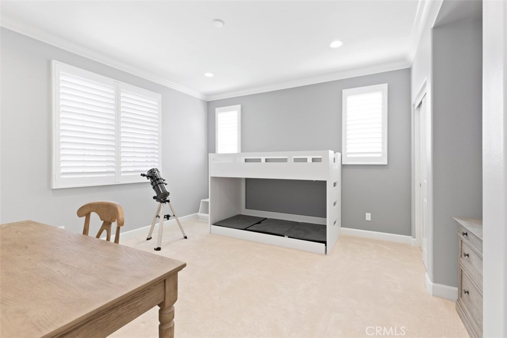 26 Lowland Irvine, CA 92602 - Photo 32 of 44 a room with a table chairs and a fireplace