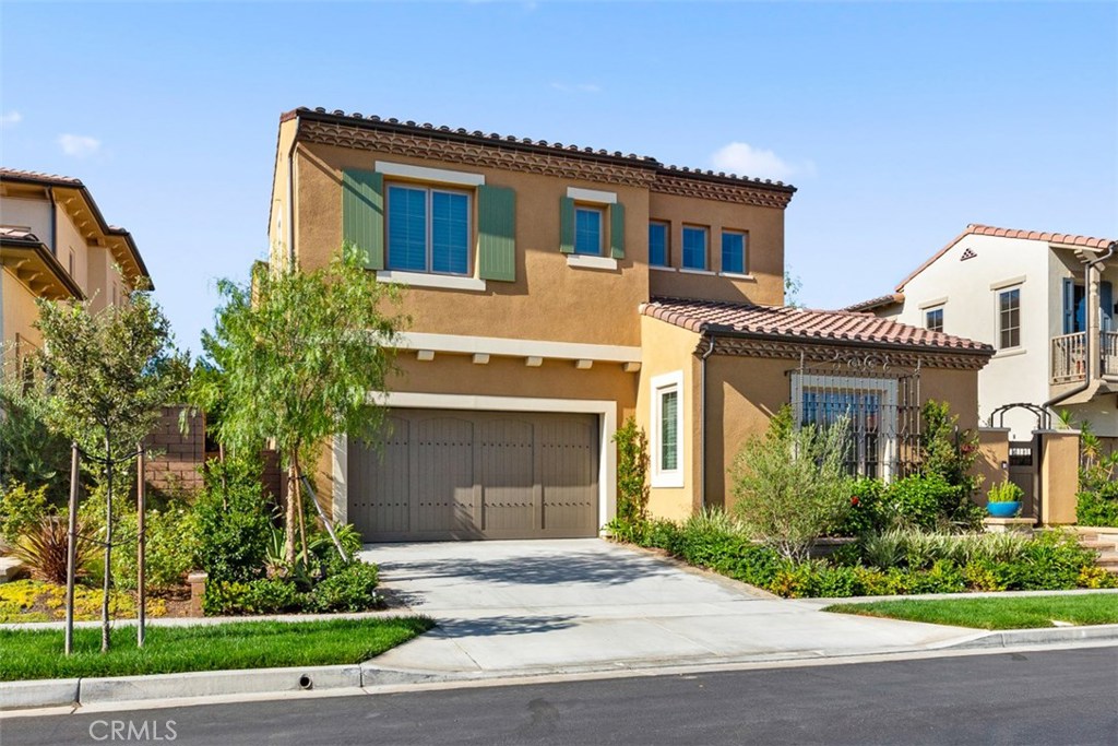26 Lowland Irvine, CA 92602 - Photo 34 of 44 a front view of a house with garden