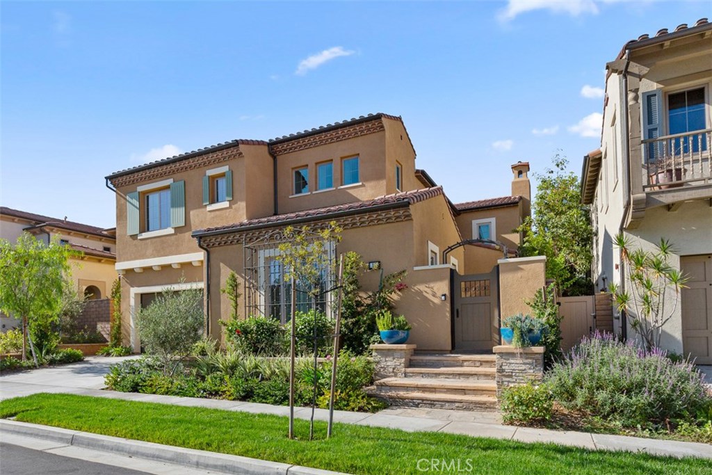 26 Lowland Irvine, CA 92602 - Photo 36 of 44 a front view of a house with a yard