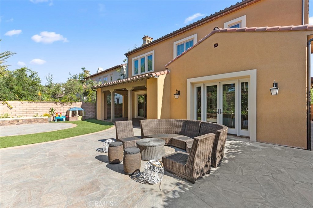 26 Lowland Irvine, CA 92602 - Photo 42 of 44 a view of a house with backyard porch and a sitting area