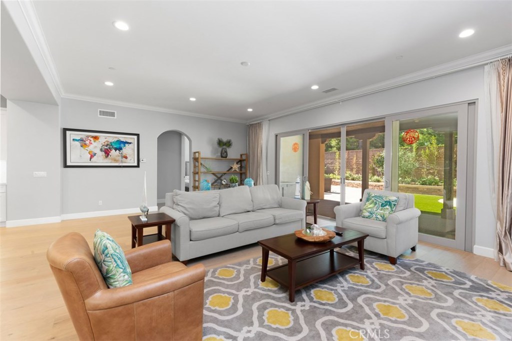 26 Lowland Irvine, CA 92602 - Photo 9 of 44 a living room with furniture and a large window