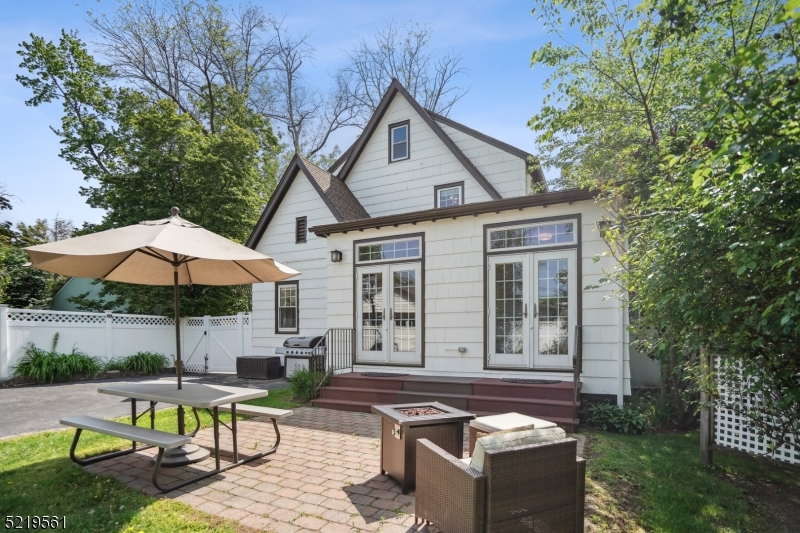 7 Undercliff Road Millburn, NJ 07041 - Photo 13 of 16 a view of a house with backyard and sitting area