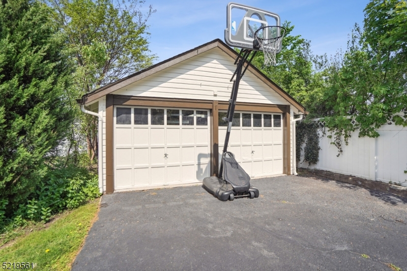 7 Undercliff Road Millburn, NJ 07041 - Photo 15 of 16 a view of a house with a yard and tree