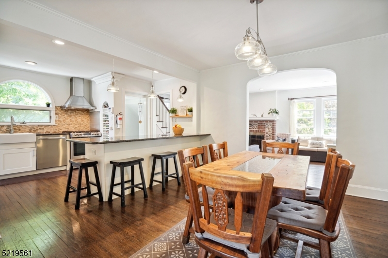 7 Undercliff Road Millburn, NJ 07041 - Photo 3 of 16 a view of a dining room with furniture window and wooden floor