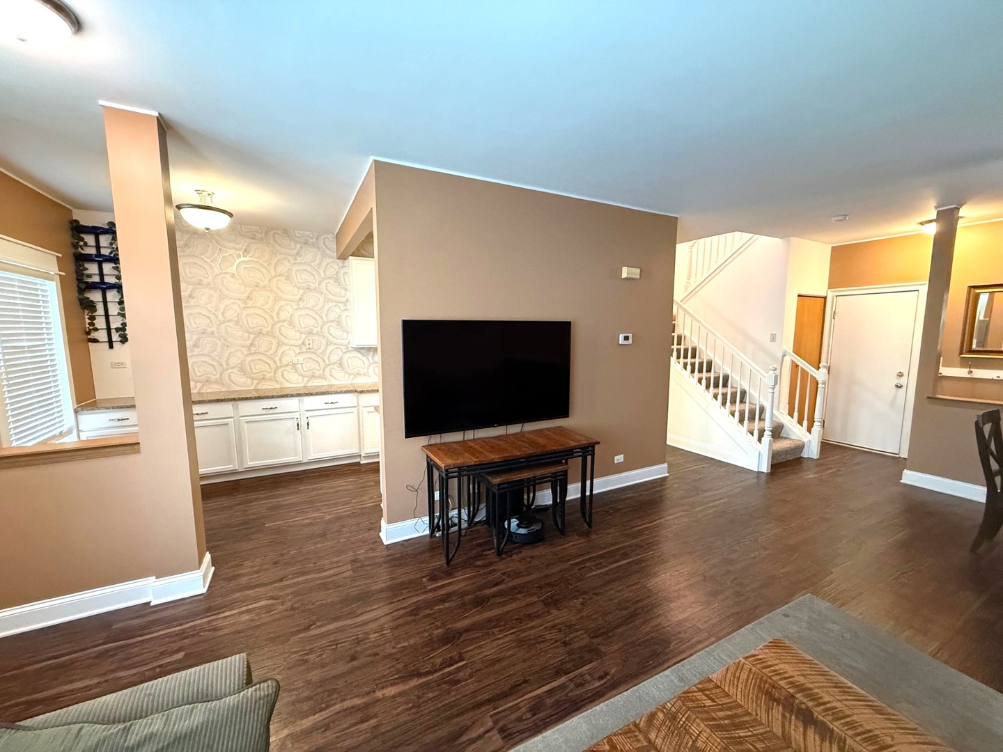 2298 Reflections Drive Aurora, IL 60502 - Photo 10 of 26 a living room with furniture and a flat screen tv