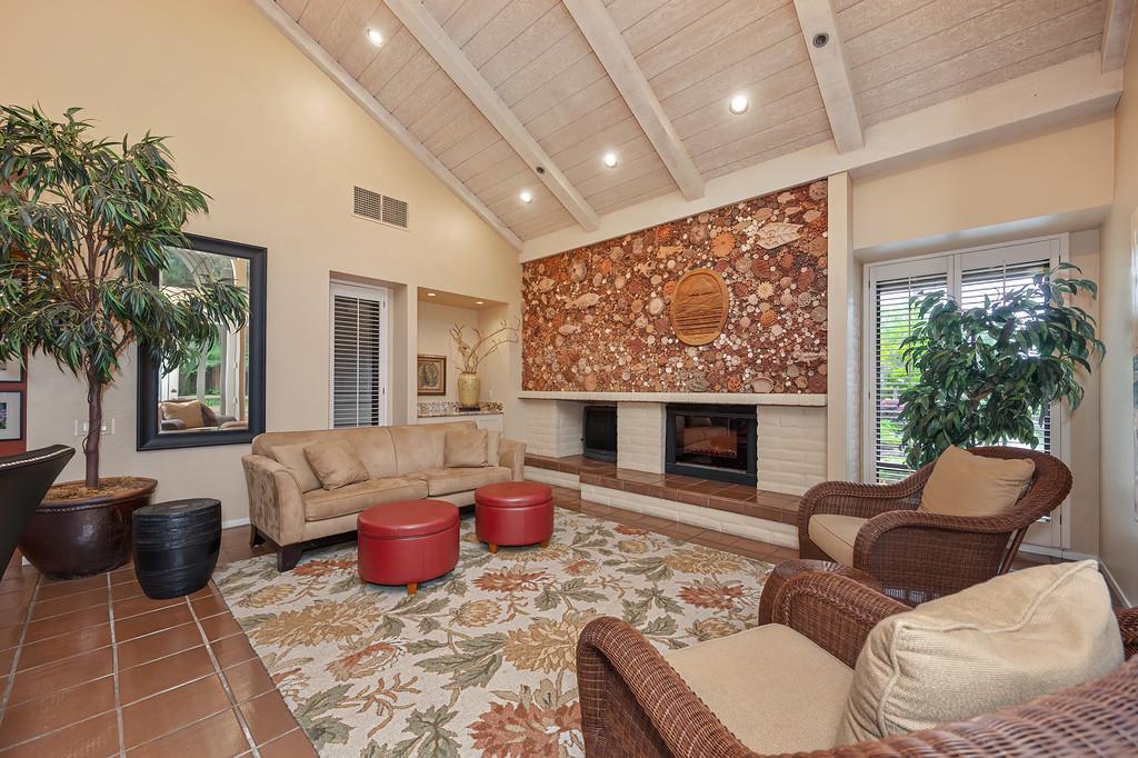 7650 Pineridge Road Fair Oaks, CA 95628 - Photo 61 of 67 a living room with furniture a large window and a fireplace