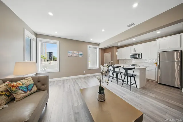 a living room with furniture and a couch