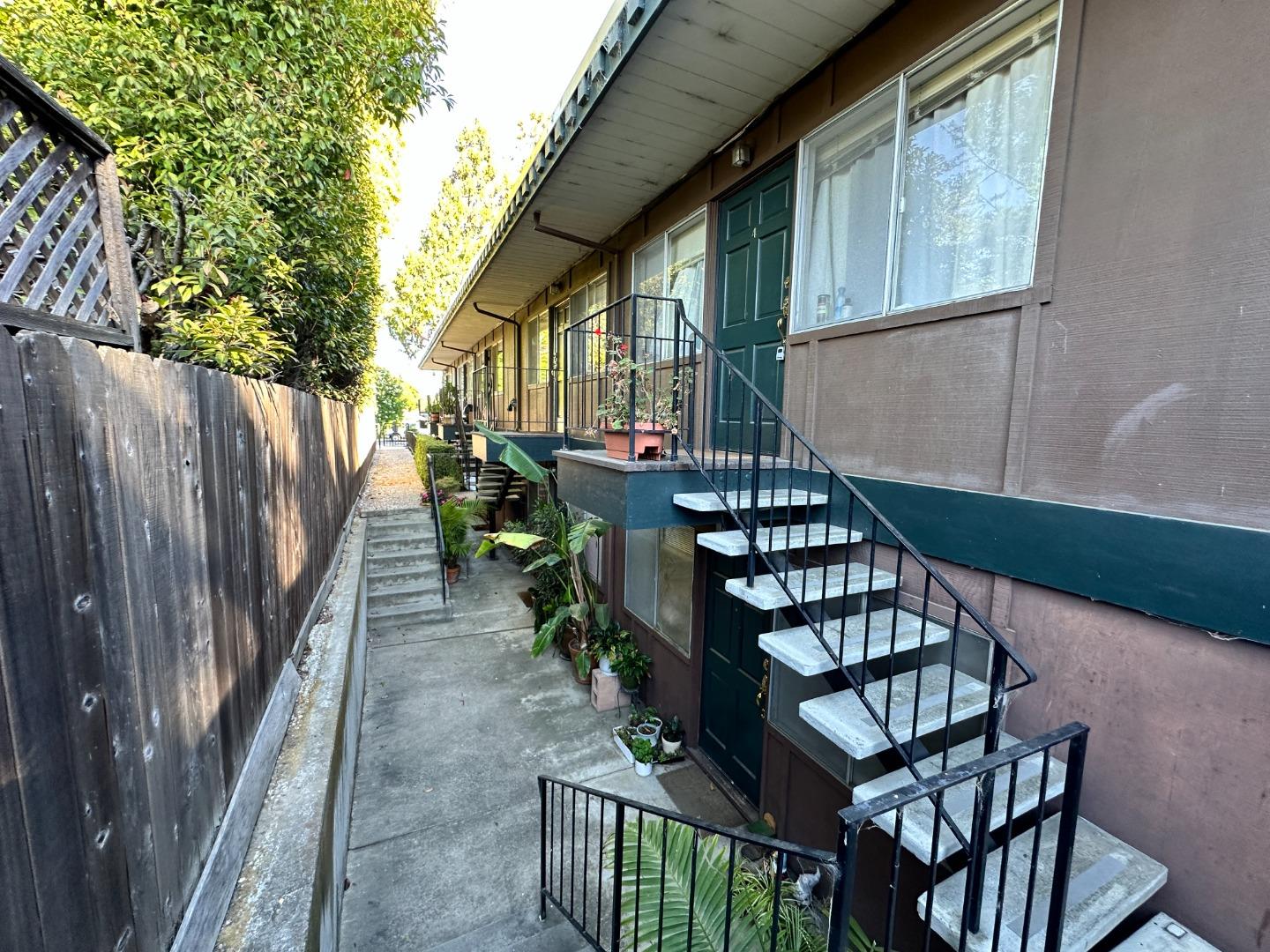 610 Walker Drive Mountain View, CA 94043 - Photo 11 of 23 a view of balcony with wooden floor and outdoor seating
