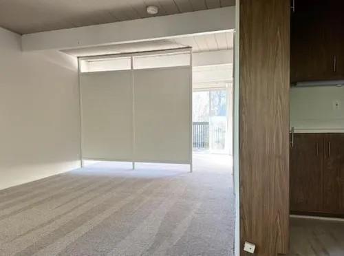610 Walker Drive Mountain View, CA 94043 - Photo 17 of 23 a view of an empty room with wooden floor and a window
